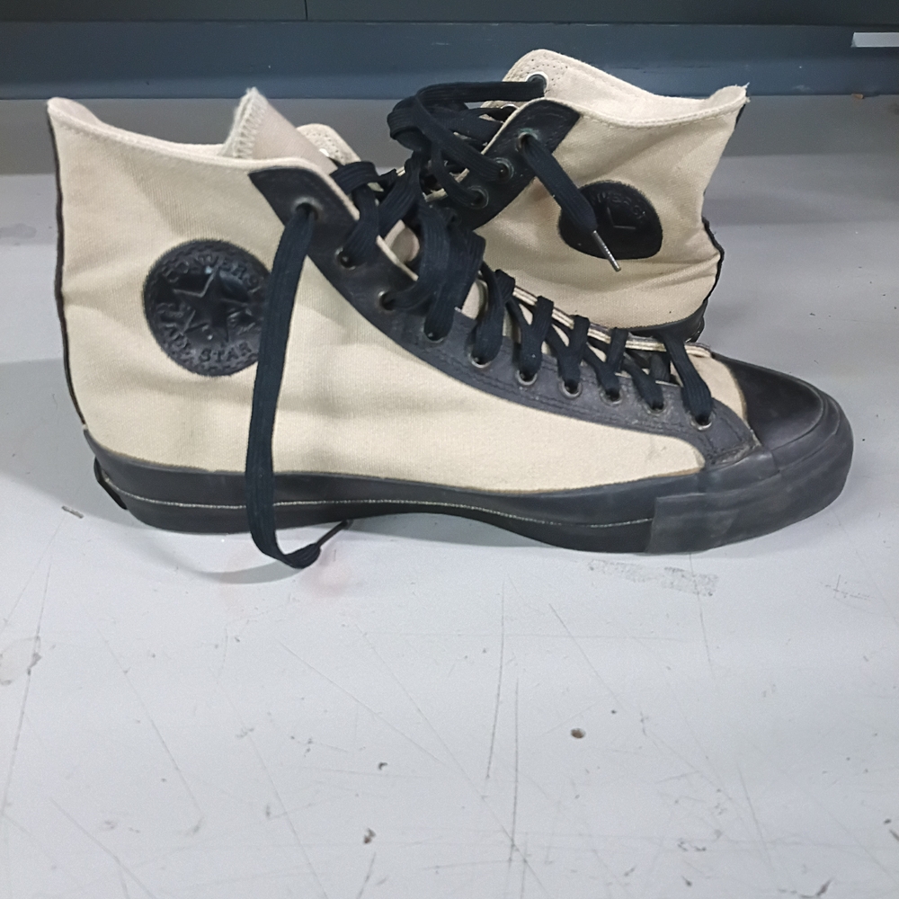 Converse High-Top Sneakers in Black and Cream